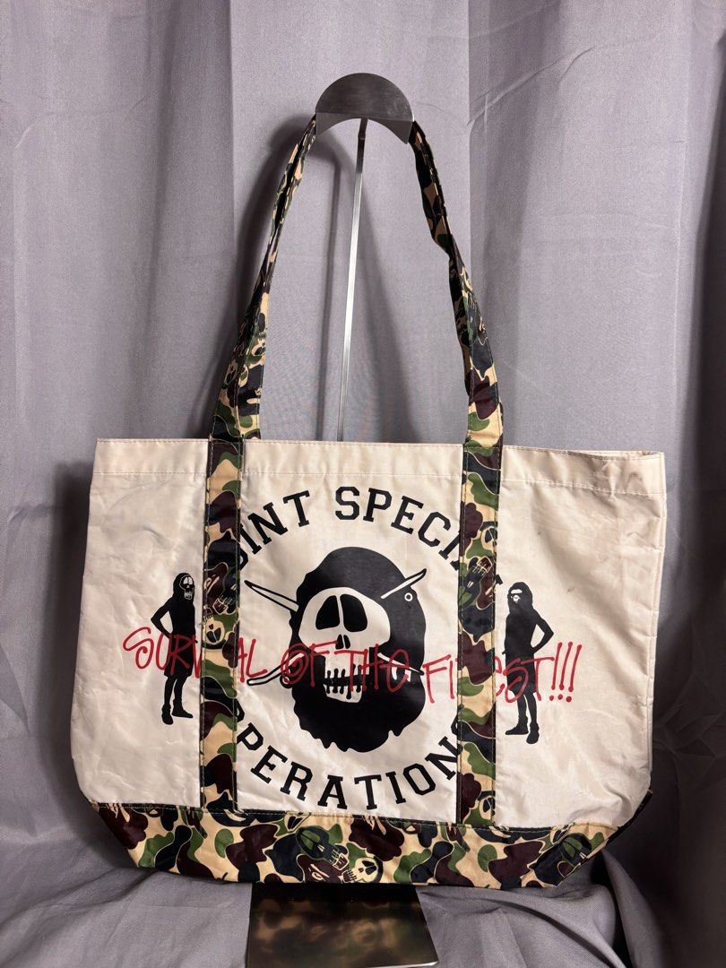 Bape x Stussy Tote Bag (Category: Belt bags, Clutches and Pouches) located in Manila. Submitted by earlylifecrisis (Listing ID 1436587046, Image 2). Description: Condition 9/10 Measure it by inch Width: 17 Length: 13.5 Depth: 5 Handle: 10.5 •Refund / Returns not allowed allowed •Please do check the dimensions size on labels sometimes are not accurate on the sizing •Ask me before purchasing.