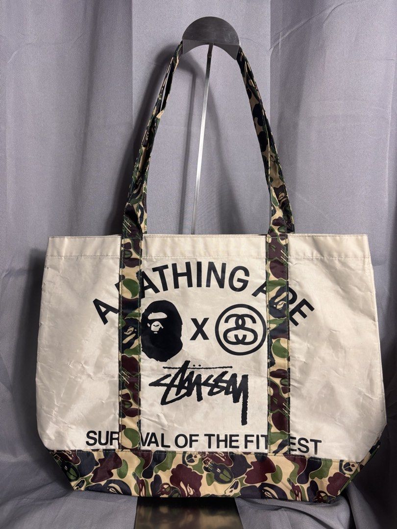 Bape x Stussy Tote Bag (Category: Belt bags, Clutches and Pouches) located in Manila. Submitted by earlylifecrisis (Listing ID 1436587046, Image 1). Description: Condition 9/10 Measure it by inch Width: 17 Length: 13.5 Depth: 5 Handle: 10.5 •Refund / Returns not allowed allowed •Please do check the dimensions size on labels sometimes are not accurate on the sizing •Ask me before purchasing.