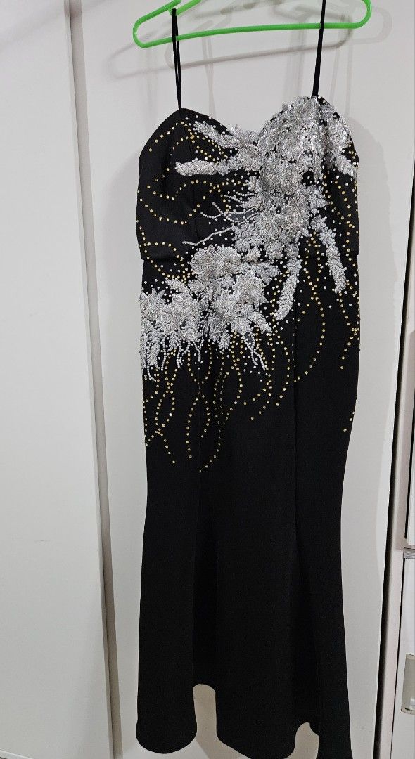 Black Embellished Evening Dress (Category: Evening dresses & gowns) located in Caloocan City. Submitted by rm.diaz (Listing ID 1436497006, Image 1). Description: - Black evening dress - Intricate silver embellishments - Sweetheart neckline - Spaghetti straps - Fitted bodice - Subtle mermaid silhouette - Zipper closure - Ideal for special occasions.