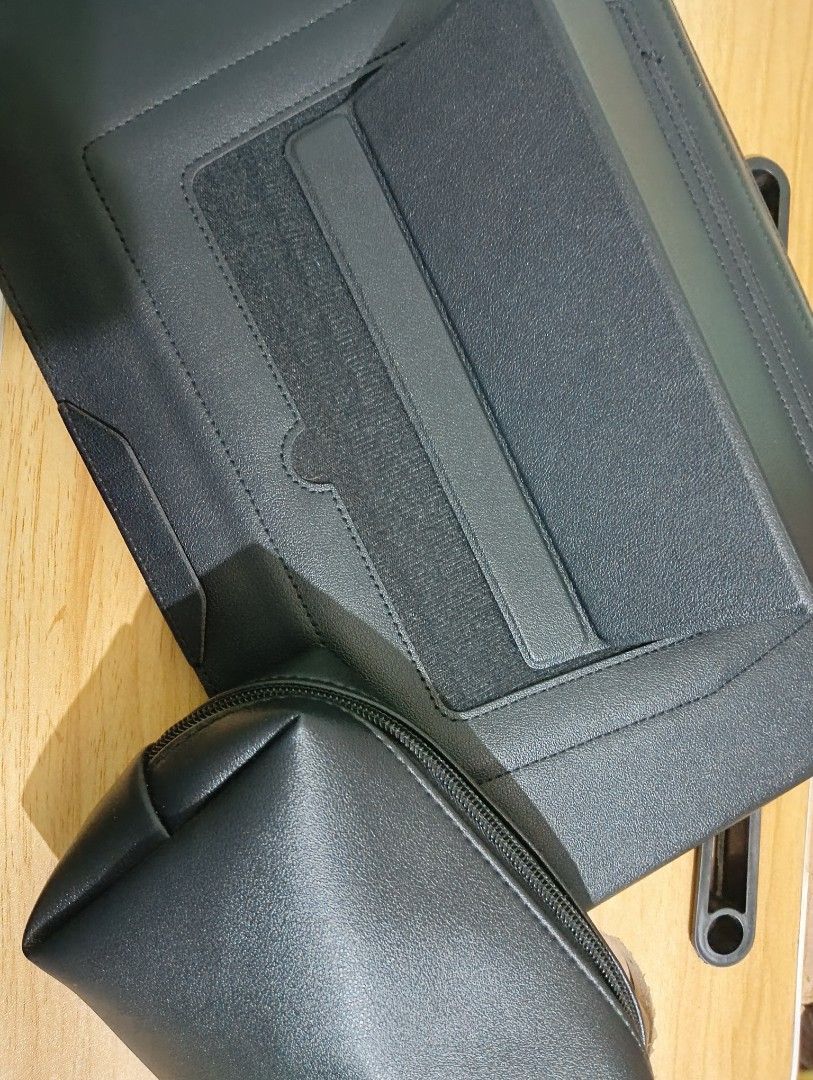 Black Laptop Sleeve with Accessory Pouch (Category: Laptop Bags & Sleeves) located in Manila. Submitted by rej.24 (Listing ID 1436647051, Image 1). Description: - Black laptop sleeve with matching accessory pouch - Flap closure - Built-in stand - Multiple interior compartments for organization - Made of leather-like material.