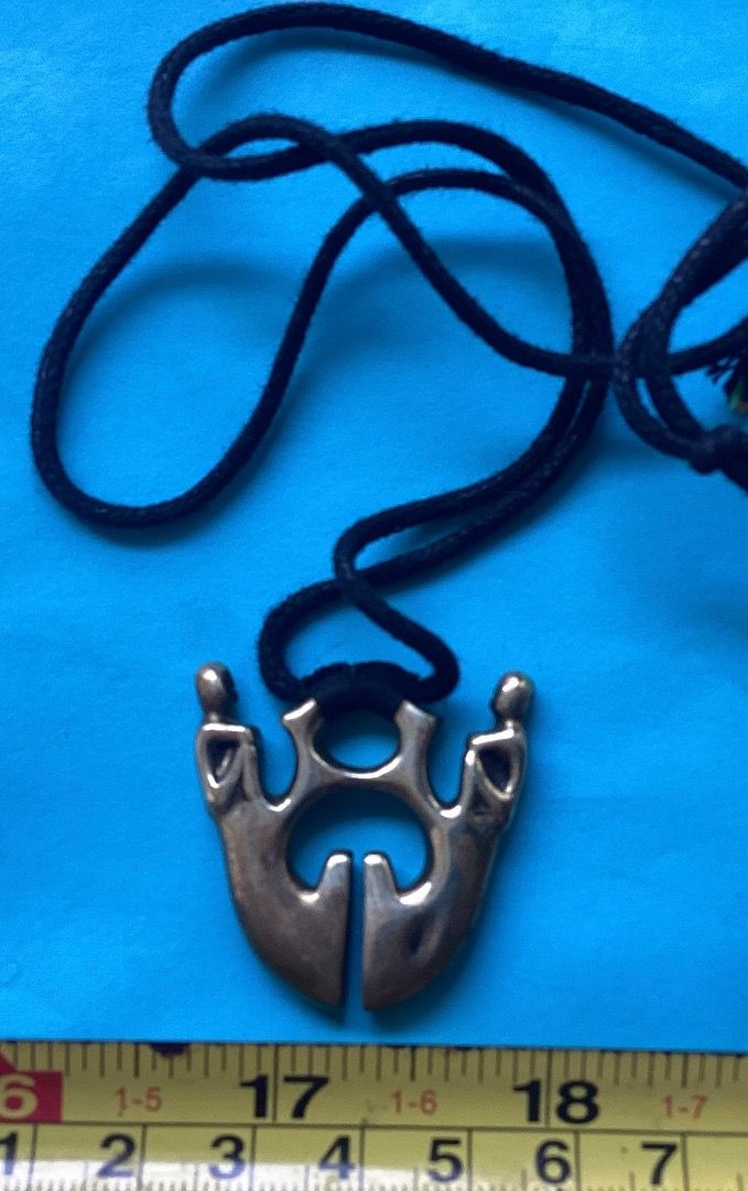 Brass rice god Pendant Necklace (Category: Necklaces) located in Subic. Submitted by arnisfma (Listing ID 1436470850, Image 2). Description: - Unique brass pendant - Black woven cord - Abstract design with two figures -rise gods.. - Pendant size : ~3.2 x3.2 cm - Simple and stylish accessory for man or women...