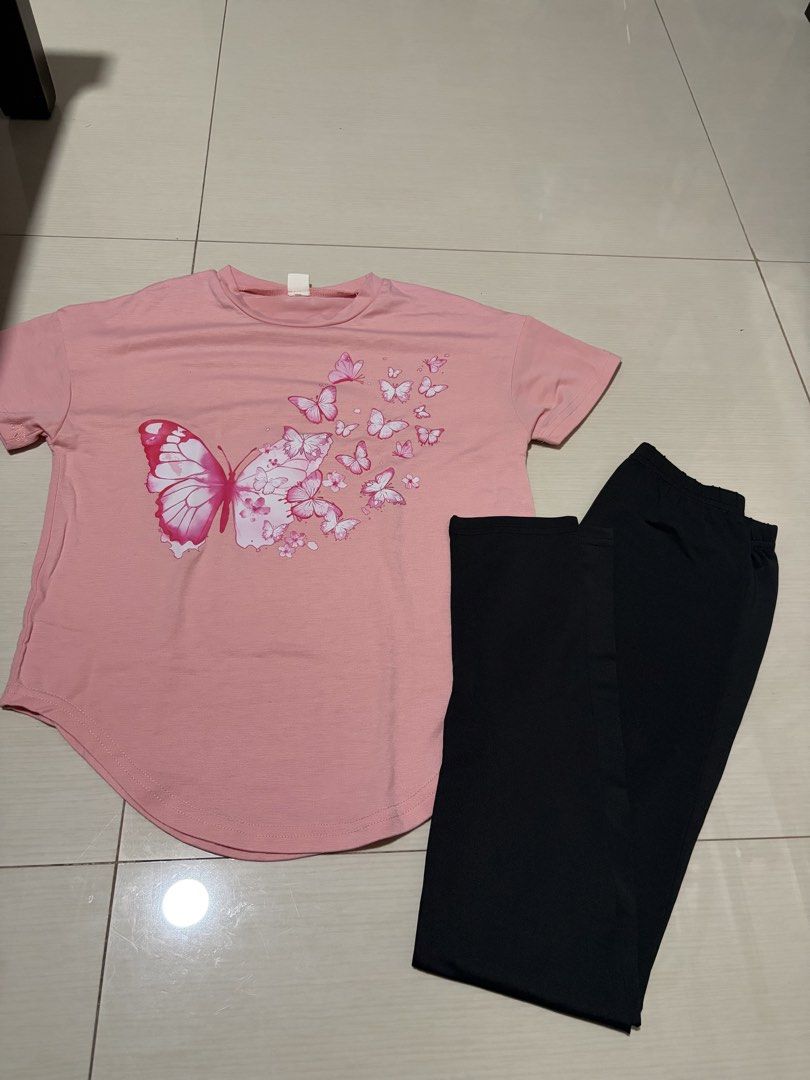 Butterfly Print Top and Black Pants Set (Category: Sets or Coordinates) located in Davao. Submitted by simplyjae (Listing ID 1436576187, Image 1). Description: - Pink t-shirt with butterfly print - Round neck - Short sleeves - Black pants - Suitable for casual wear Shipping fees shall be shouldered by the buyer. Location; Davao City.