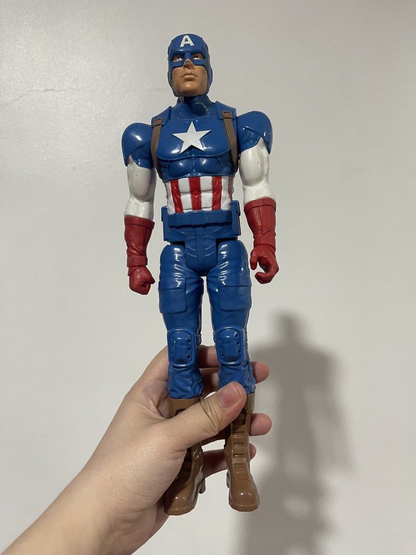 Captain America Action Figure (Category: Figurines & Statues) located in Taguig. Submitted by supplementary (Listing ID 1436588107, Image 1). Description: - Captain America action figure - Iconic blue, white, and red suit - Detailed design with star emblem - Classic helmet included.