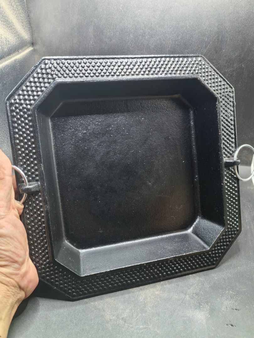 Cast-Iron Rectangular Pan (Category: Other Kitchenware & Tableware) located in Cebu City. Submitted by dudes_villanueva (Listing ID 1436474083, Image 3). Description: Cast-Iron Rectangular Pan Good as New. Very Heavy 📌 Distinctive studded or hobnail pattern along the border and attached metal handles on two sides, often found as part of antique or decorative kitchenware sets. 📌 Material: Heavy-duty cast iron. 📌 Design: Octagonal outer shape wi
