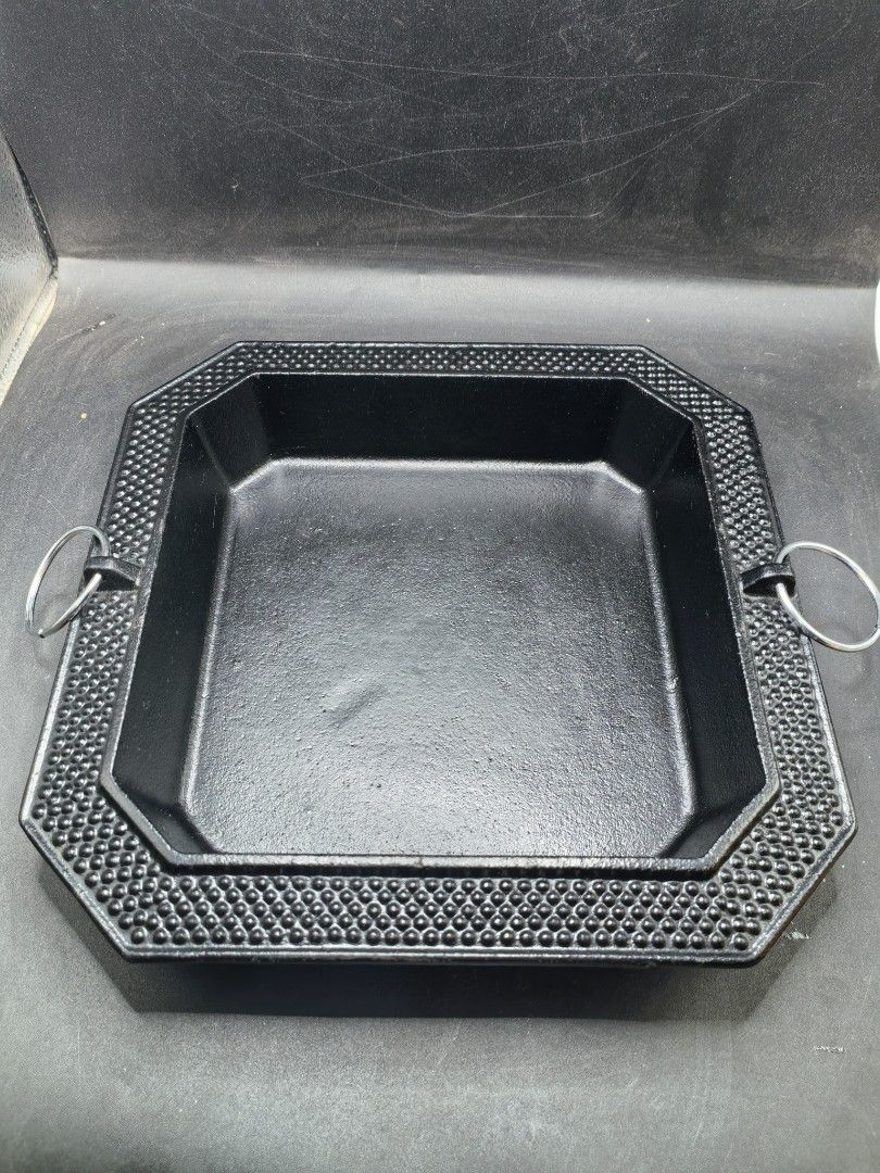 Cast-Iron Rectangular Pan (Category: Other Kitchenware & Tableware) located in Cebu City. Submitted by dudes_villanueva (Listing ID 1436474083, Image 1). Description: Cast-Iron Rectangular Pan Good as New. Very Heavy 📌 Distinctive studded or hobnail pattern along the border and attached metal handles on two sides, often found as part of antique or decorative kitchenware sets. 📌 Material: Heavy-duty cast iron. 📌 Design: Octagonal outer shape wi