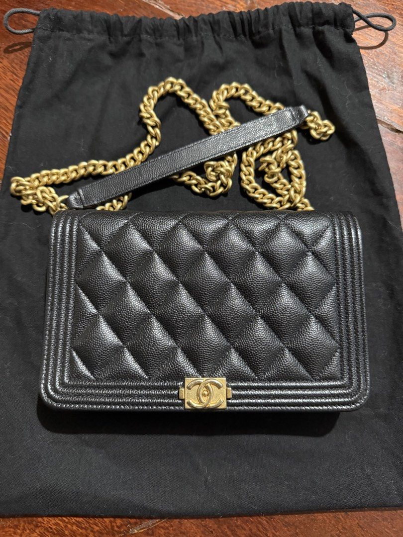 Chanel Boy Wallet on Chain Black (Category: Luxury Bags & Wallets) located in Calamba. Submitted by eskaparatengpuno (Listing ID 1436550513, Image 1). Description: - Authentic Chanel Boy Wallet on Chain - Excellent used condition, only used 5x max - Caviar leather - Gold hardware - Multiple interior compartments and zippered pocket - Includes dust bag - measures 19.2 x 12.3 x 3.5 cm.