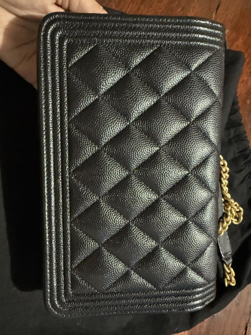 Chanel Boy Wallet on Chain Black (Category: Luxury Bags & Wallets) located in Calamba. Submitted by eskaparatengpuno (Listing ID 1436550513, Image 3). Description: - Authentic Chanel Boy Wallet on Chain - Excellent used condition, only used 5x max - Caviar leather - Gold hardware - Multiple interior compartments and zippered pocket - Includes dust bag - measures 19.2 x 12.3 x 3.5 cm.