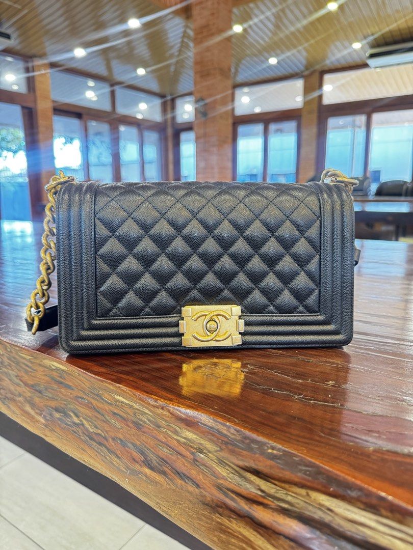 Chanel Le Boy Caviar Old Medium (Category: Luxury Bags & Wallets) located in Pasay City. Submitted by missnayeon (Listing ID 1436548020, Image 1). Description: - Authentic Chanel Boy Bag (Series 28) - Condition 9.5/10 (excellent condition) - inclusions: dust bag, card, and box.