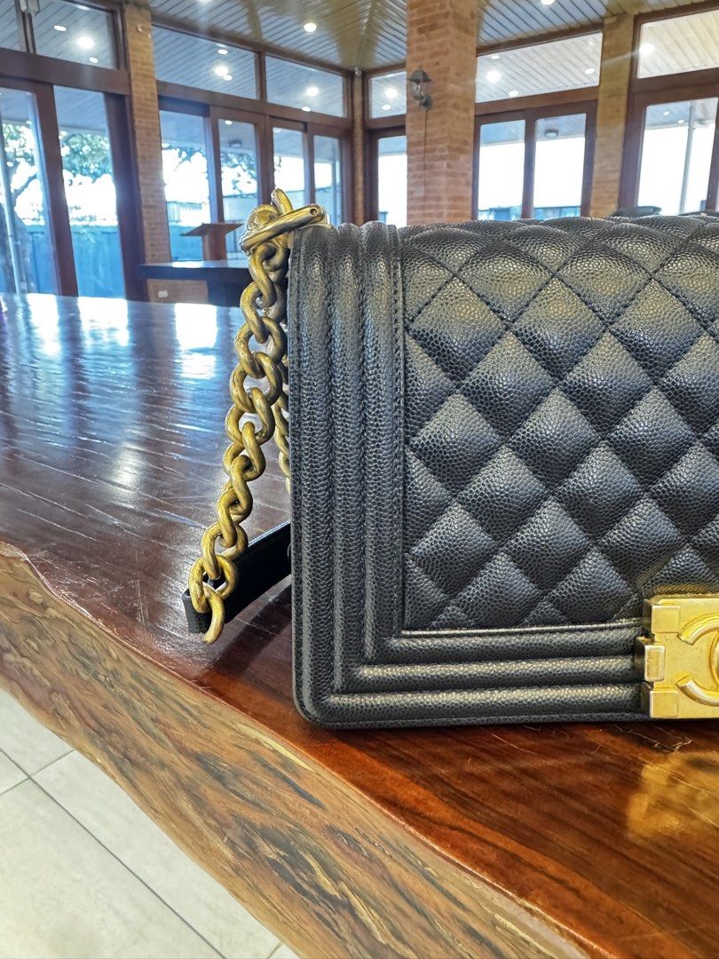 Chanel Le Boy Caviar Old Medium (Category: Luxury Bags & Wallets) located in Pasay City. Submitted by missnayeon (Listing ID 1436548020, Image 2). Description: - Authentic Chanel Boy Bag (Series 28) - Condition 9.5/10 (excellent condition) - inclusions: dust bag, card, and box.