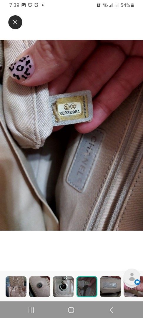 Chanel Tote Bag with Chain Straps (Category: Luxury Bags & Wallets) located in Paranaque City. Submitted by andim8 (Listing ID 1436649748, Image 3). Description: - Authentic Chanel Deauville tote bag in beautiful nude color - Beige leather exterior with embossed Chanel logo - Chain straps - Magnetic closure - Fabric lining with Chanel label and hologram sticker .