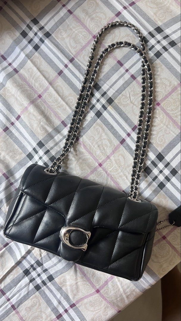 Coach Quilted Tabby 20 Shoulder Bag with silver hardware. (Category: Luxury Bags & Wallets) located in Quezon City. Submitted by samanthalim1989 (Listing ID 1436491044, Image 1). Description: - Coach Pillow Madison shoulder bag - Chain strap - Quilted design - Turnlock closure - Flap closure - Coach tag inside - Silver-tone hardware - Minor leather imperfections WHAT YOU SEE IS WHAT YOU GET ✔️ AUTHENTICATION NOT GUARANTEED ✔️ GIVEN AS A GIFT.