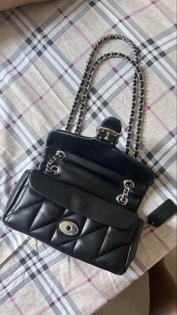 Coach Quilted Tabby 20 Shoulder Bag with silver hardware. (Category: Luxury Bags & Wallets) located in Quezon City. Submitted by samanthalim1989 (Listing ID 1436491044, Image 2). Description: - Coach Pillow Madison shoulder bag - Chain strap - Quilted design - Turnlock closure - Flap closure - Coach tag inside - Silver-tone hardware - Minor leather imperfections WHAT YOU SEE IS WHAT YOU GET ✔️ AUTHENTICATION NOT GUARANTEED ✔️ GIVEN AS A GIFT.
