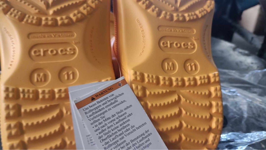 Crocs Classic Clog - Yellow - Size 11 (Category: Slippers & Slides) located in Manila. Submitted by bukid (Listing ID 1436557419, Image 2). Description: - Authentic Crocs Classic Clogs - Vibrant yellow color - Size: M11 - Made in Vietnam - Includes original tag - Classic Crocs design with ventilation ports - Easy to clean - Perfect for casual wear.