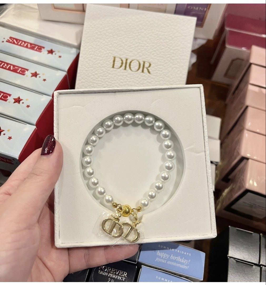Dior Pearl Bracelet with CD Charms (Category: Bracelets) located in Las Pinas. Submitted by tin0805 (Listing ID 1436525240, Image 1). Description: Elegant Dior bracelet featuring lustrous pearls and iconic CD charms. The bracelet comes with its original Dior box. A beautiful accessory that adds a touch of sophistication to any outfit. Perfect for gifting or adding to your jewelry collection. NEVER OPENED. Perfect for mothers gift. RFS: Declutteri
