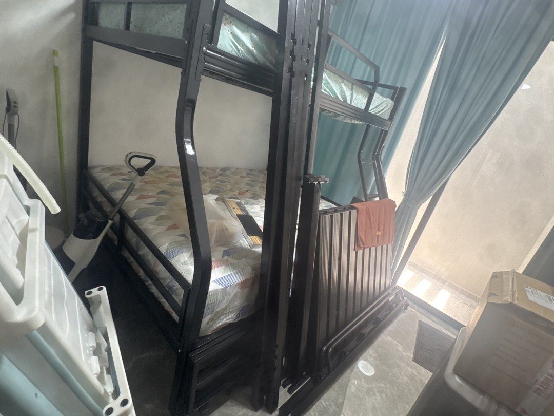 Double deck bed frame (Category: Bed Frames & Mattresses) located in Singapore. Submitted by normese (Listing ID 1436618644, Image 1). Description: Selling the bed frame only, Bottom is queen size top is super single size .