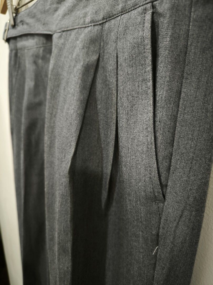 Drak Gray High Waisted Tailored Trousers (Category: Trousers) located in Quezon City. Submitted by slram (Listing ID 1436563056, Image 3). Description: 🟦 Double Pleated Tailored Trousers - Dark Gray - Size: 33 - Dimes: W - 33 L - 38 Leg Opening - 7.5 Frint Rise - 12.7 Insean - 25.3 ₱1,200 plush sf LOC: QC MOP: Gcash, Landbank, Maya .