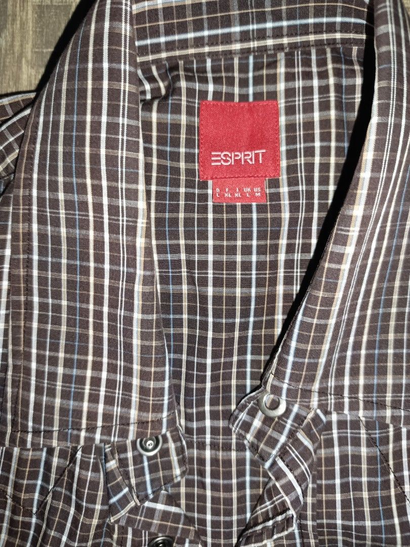 Esprit Plaid Long Sleeve Shirt (Category: Longsleeves) located in Manila. Submitted by jaymarkmcacuyong (Listing ID 1436596654, Image 2). Description: - Esprit long sleeve shirt - Plaid pattern - Button-down front - Chest pocket - Collar - 100% cotton - Size: L - Color: Brown and white.