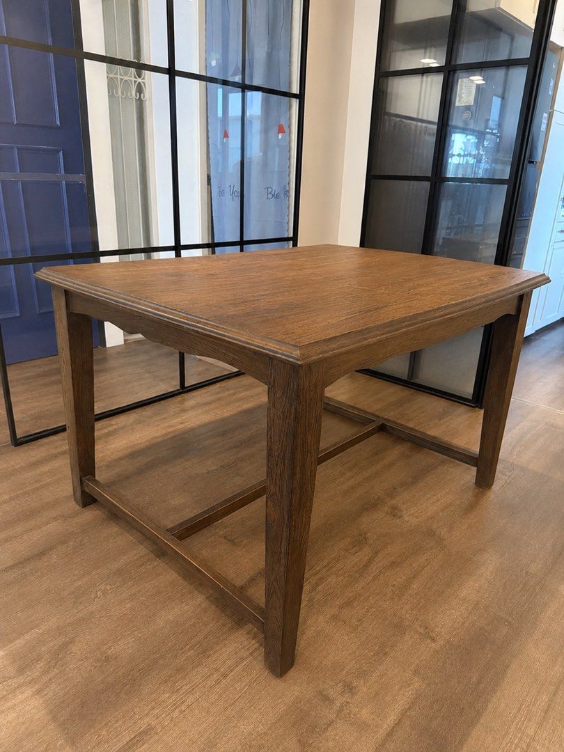 Extendable Solid Wood Dining Table (Category: Tables & Sets) located in Singapore. Submitted by djoelicious (Listing ID 1436549482, Image 1). Description: - Custom made Extendable Solid Teak-wood dining table. With foot rest. Made in Java. - Extendable from 6 seaters to 8 seaters. - Measurement: 120x100x78cm (6 seaters). - Beautiful, warm wood tone - Bench is not included. - Perfect for dining room or kitchen - Condition as is..
