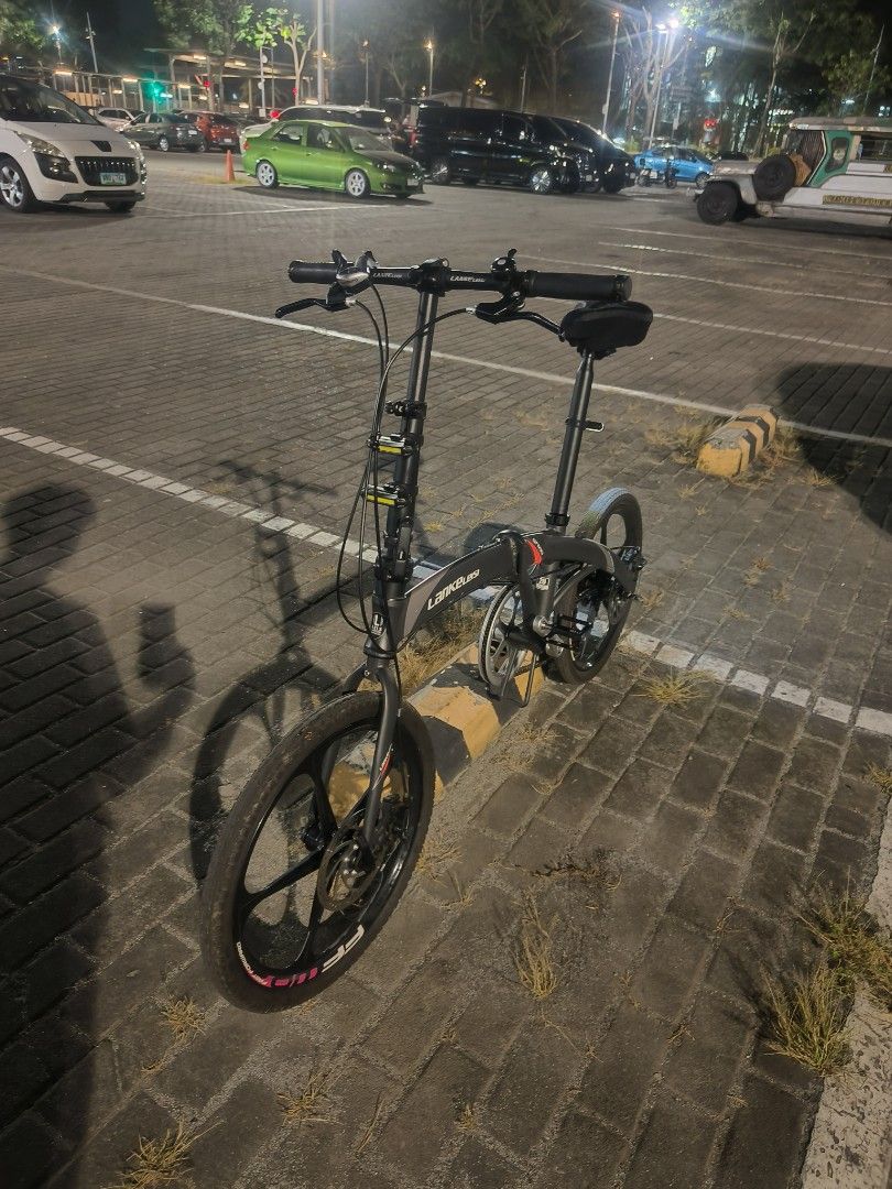 Foldable 20" Bike - Lankeleisi QF600 (Category: Bicycles) located in Makati City. Submitted by franco31 (Listing ID 1436586961, Image 3). Description: Alloy parts, 20Kg, good for recreational and exercise. 7-speed Shimano transmission. Alloy magwheels. Dual disk brakes..