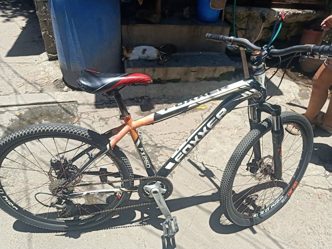 Foxxer FX260 MTB 26er (Category: Bicycles) located in Manila. Submitted by youngcloud.e6e41e (Listing ID 1436494993, Image 1). Description: - Foxxe FX250 Mountain Bike - Disc brakes - X-Nine stem - maddux DC 3.0 rims - Black and orange frame - Black seat with red accents - shimano crankset - shimano RD.