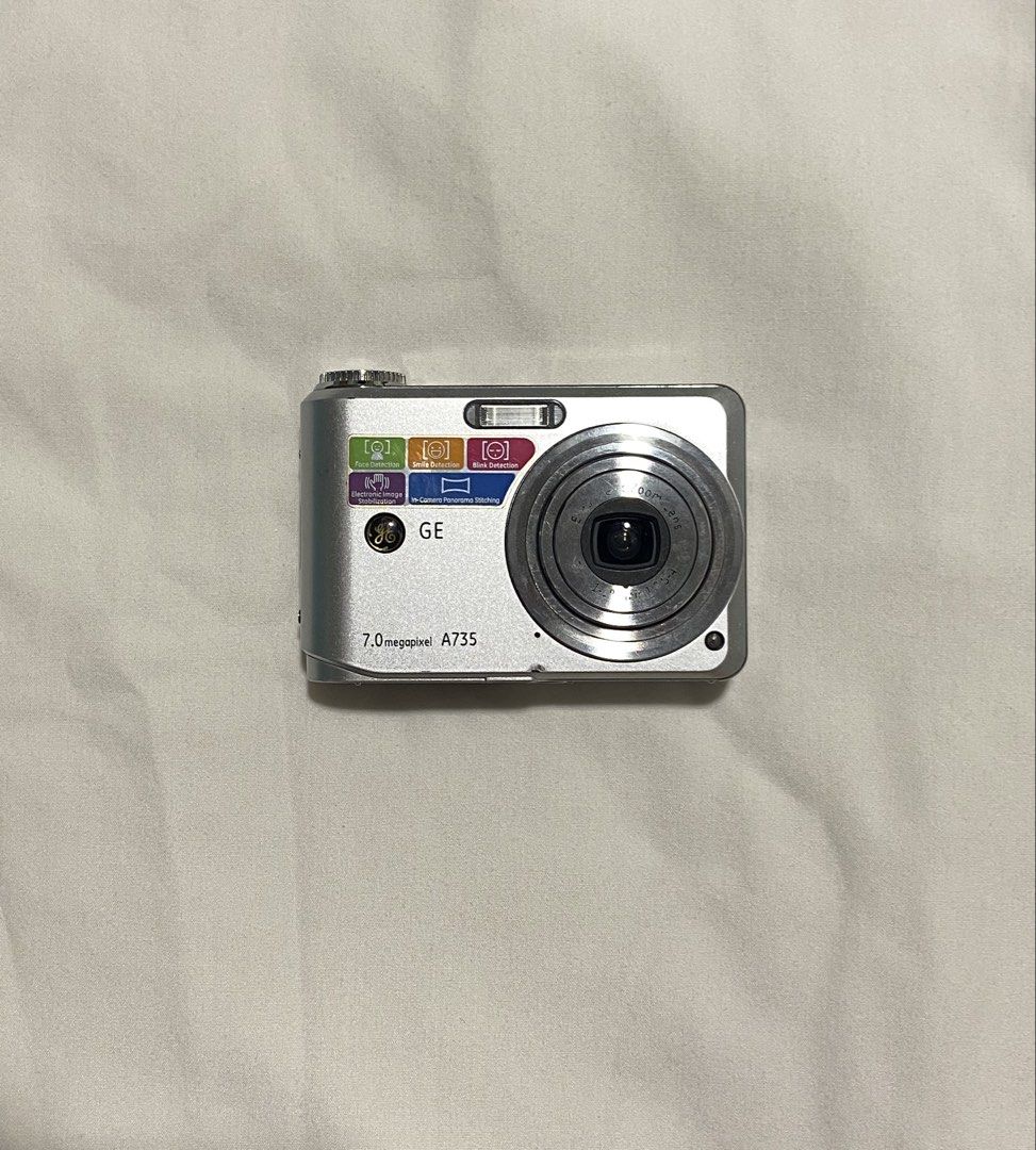 GE A735 Silver DigiCam (Working) (Category: Cameras) located in San Fernando. Submitted by _wntrshp (Listing ID 1436631271, Image 3). Description: - ge a735 digital camera - 7.0 mp, silver body - built-in red flash + working zoom lens - A4 battery included (no sd card) - LCD issue: shows white screen while taking pics, so preview is limited - buttons seem to be working, though not fully tested due to LCD issue - photos still come out clear & cris
