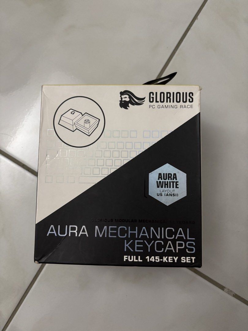 Glorious Aura Mechanical Keycaps - Full 145-Key Set (Category: Computer Keyboard) located in Manila. Submitted by wynx02 (Listing ID 1436644093, Image 1). Description: - Glorious Aura Mechanical Keycaps - 145-key set - US (ANSI) layout - Made of durable PBT plastic - LED light compatible - Transparent legends for backlit keyboards - Compatible with MX style stems - Fits GMMK 2 & GMMK PRO keyboards.