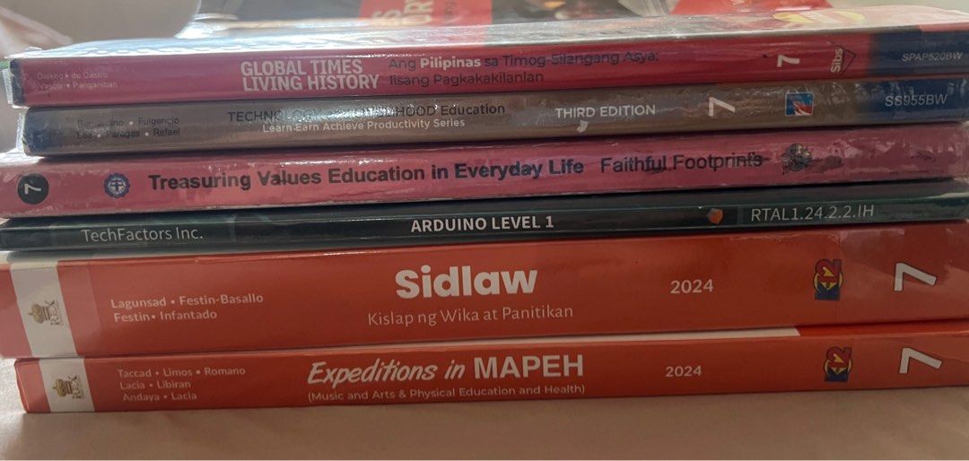 Grade 7 Books (Category: Textbooks) located in Quezon City. Submitted by momsgaragesale (Listing ID 1436578814, Image 2). Description: Grade 7 textbooks Preloved (used) With pen markings on few pages Php 250 each If bundle, Php 1500 only if take all 8 books.
