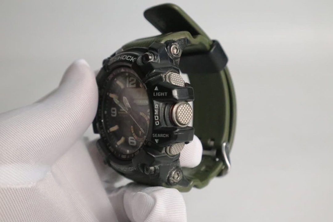 G-Shock Mudmaster Watch (Category: Men's Watches) located in Cabanatuan. Submitted by albertgonzales27 (Listing ID 1436530629, Image 2). Description: - G-Shock Mudmaster watch - Black case with green strap - Digital display for time and day - Includes light, compass, and search functions - Analog hands and digital display - Water resistant up to 200M.