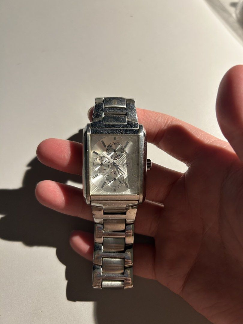Guess Silver Rectangular Watch (Category: Watches) located in Kuala Lumpur. Submitted by mcmc8888 (Listing ID 1436590844, Image 1). Description: Selling some old watch as not using anymore.