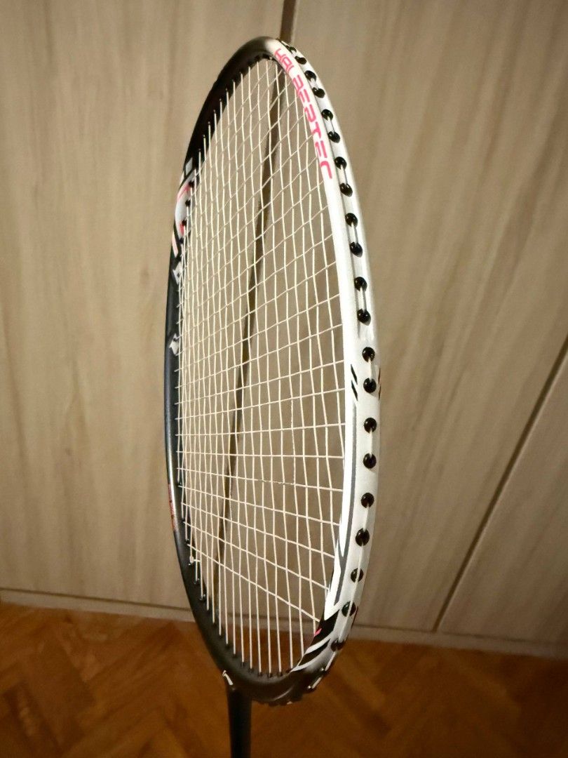 Halbertec 2000 (Category: Racket & Ball Sports) located in Singapore. Submitted by leowongkx123 (Listing ID 1436613924, Image 2). Description: - Brand new Li-Ning badminton racket - Stylish black, white, and pink design - Ideal for casual and competitive players.
