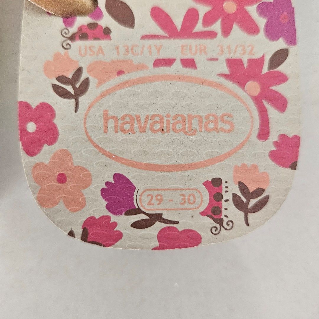 Brand new Havaianas Floral Flip-Flops - Size 29/30 (Category: Babies & Kids Fashion) located in Singapore. Submitted by rach3licious (Listing ID 1436487626, Image 2). Description: Brand new, never been worn! Cute Havaianas flip-flops with floral design. Bought the wrong size for my daughter. Size 29/30. Selling for only $12! .