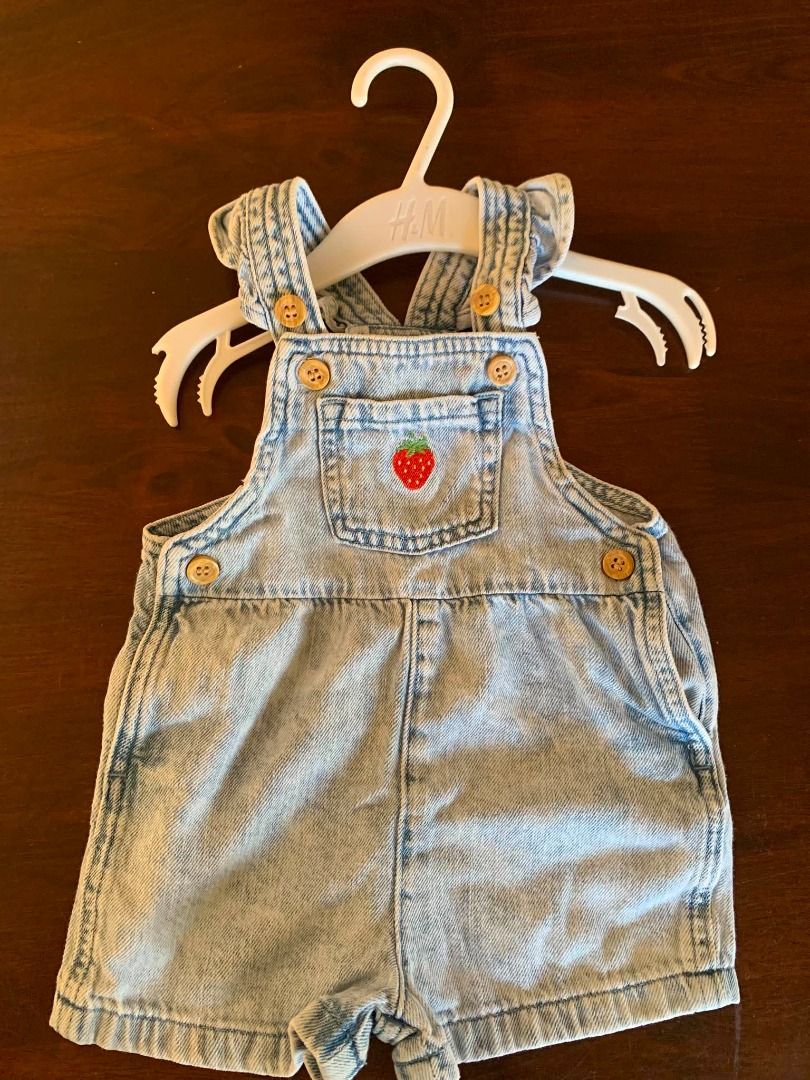 H&M Strawberry Denim Overall Shorts (Category: Babies & Kids Fashion) located in Muntinlupa City. Submitted by aubreyraven (Listing ID 1436539936, Image 1). Description: - H&M baby denim overalls - Adorable strawberry embroidery - Stylish wooden buttons - Light blue wash - Size: 6 months (6M).