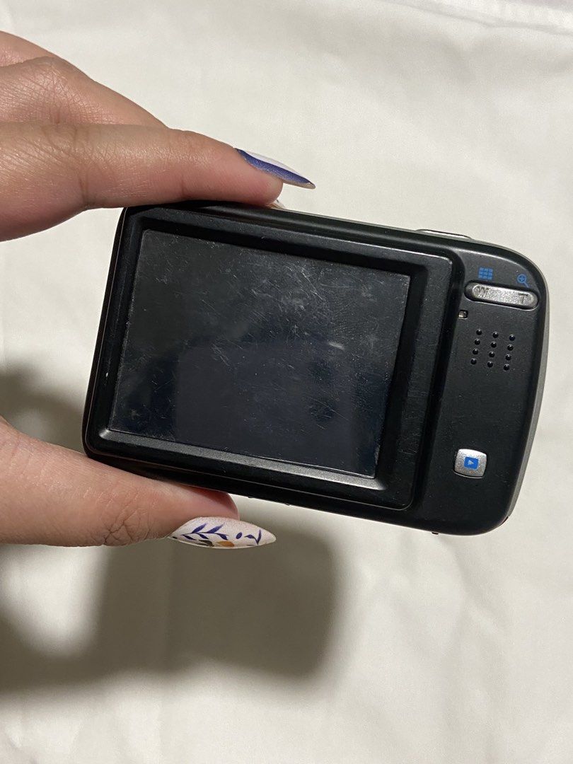 HP CW450i Digicam (Fully Working) (Category: Cameras) located in San Fernando. Submitted by _wntrshp (Listing ID 1436628509, Image 2). Description: - hp cw450i touch screen - 12.1 mp - 4x optical zoom lens - red body - A4 battery included (no sd card) - screen & body has minimal signs of usage - built-in red flash - all buttons/functions working - LCD has minor dark shading on screen, barely noticeable and doesn’t affect photos. - can send pics/t