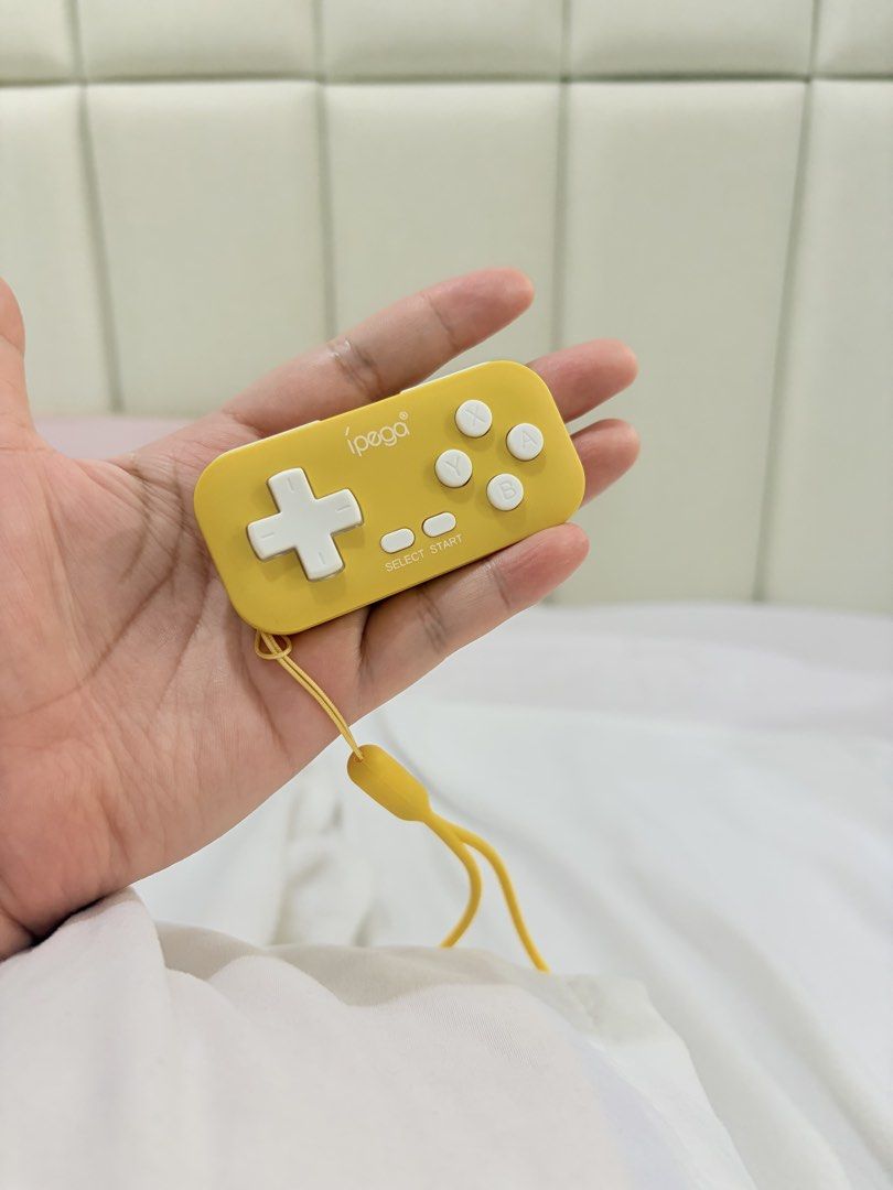 Ipega Mini Gamepad For N-Switch/N-Switch Lite/Android/Windows/P3 (PG-9193A) (Category: Controllers) located in Taguig. Submitted by crelscozynook (Listing ID 1346186745, Image 2). Description: IPEGA Mini Gamepad/Controller (Brand New, Sealed) Available in colors blue and yellow Compatible with Nintendo Switch, Android, Windows, P3 Description EASY TO CARRY AND CUTE! Immerse in a new game style with these features of the mini gamepad: 1. This cont