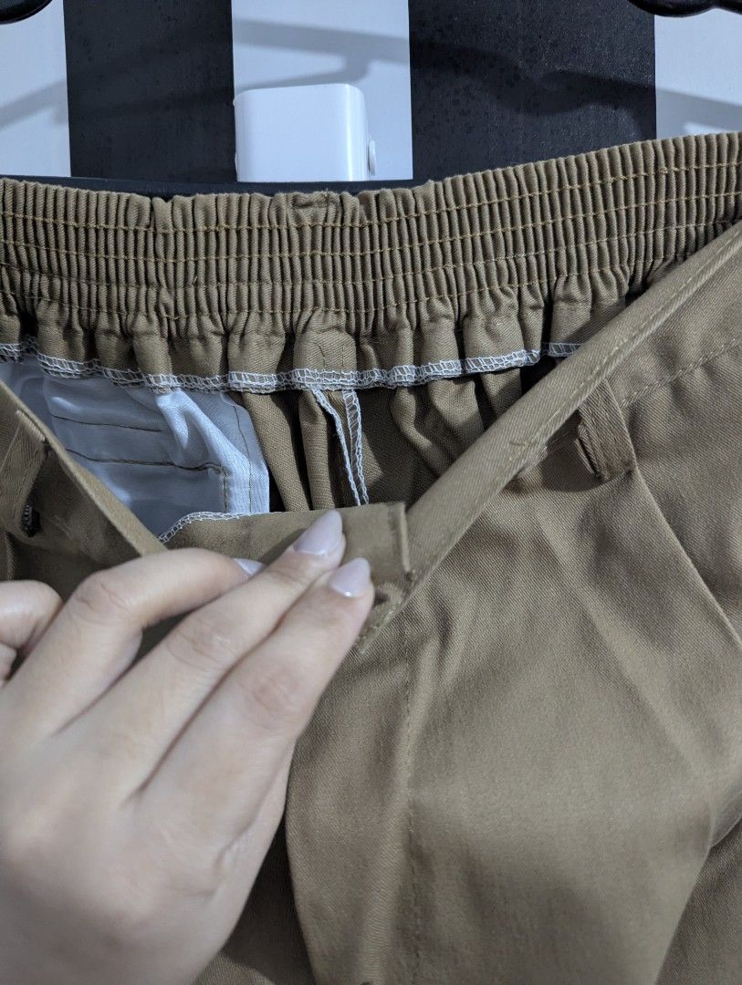 Khaki Brown Garterized Cotton Pants / Slacks (Category: Trousers) located in Pasig City. Submitted by igustnik (Listing ID 1436622555, Image 3). Description: XL Kasya sa 30-34 38 inches in length May allowance pa kasi Garterized sya 100% Cotton 2 pieces yung ganto namin RFS: Gusto ng anak ko yung ibang klase pa ng pants ♥️ Note: COLOR MAY VARY.