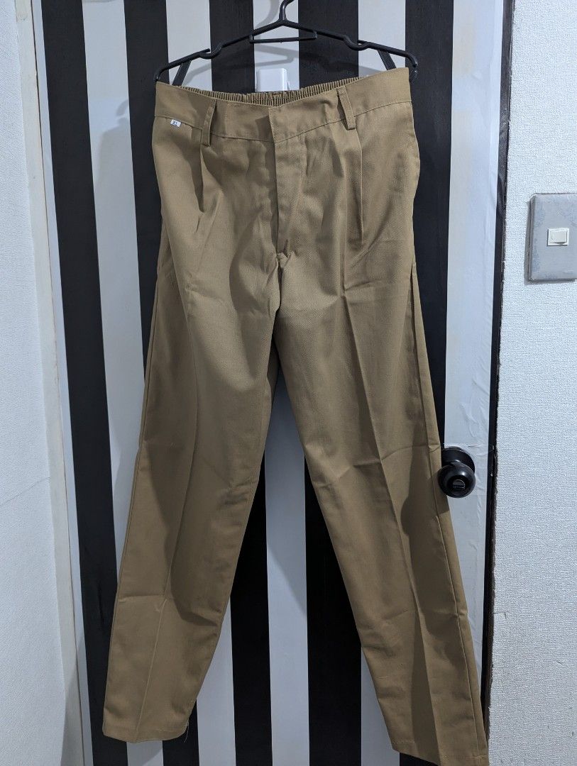 Khaki Brown Garterized Cotton Pants / Slacks (Category: Trousers) located in Pasig City. Submitted by igustnik (Listing ID 1436622555, Image 1). Description: XL Kasya sa 30-34 38 inches in length May allowance pa kasi Garterized sya 100% Cotton 2 pieces yung ganto namin RFS: Gusto ng anak ko yung ibang klase pa ng pants ♥️ Note: COLOR MAY VARY.