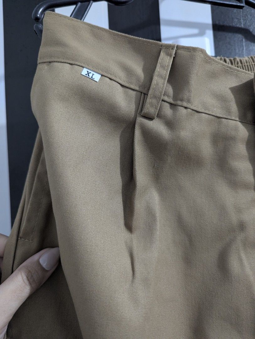 Khaki Brown Garterized Cotton Pants / Slacks (Category: Trousers) located in Pasig City. Submitted by igustnik (Listing ID 1436622555, Image 2). Description: XL Kasya sa 30-34 38 inches in length May allowance pa kasi Garterized sya 100% Cotton 2 pieces yung ganto namin RFS: Gusto ng anak ko yung ibang klase pa ng pants ♥️ Note: COLOR MAY VARY.