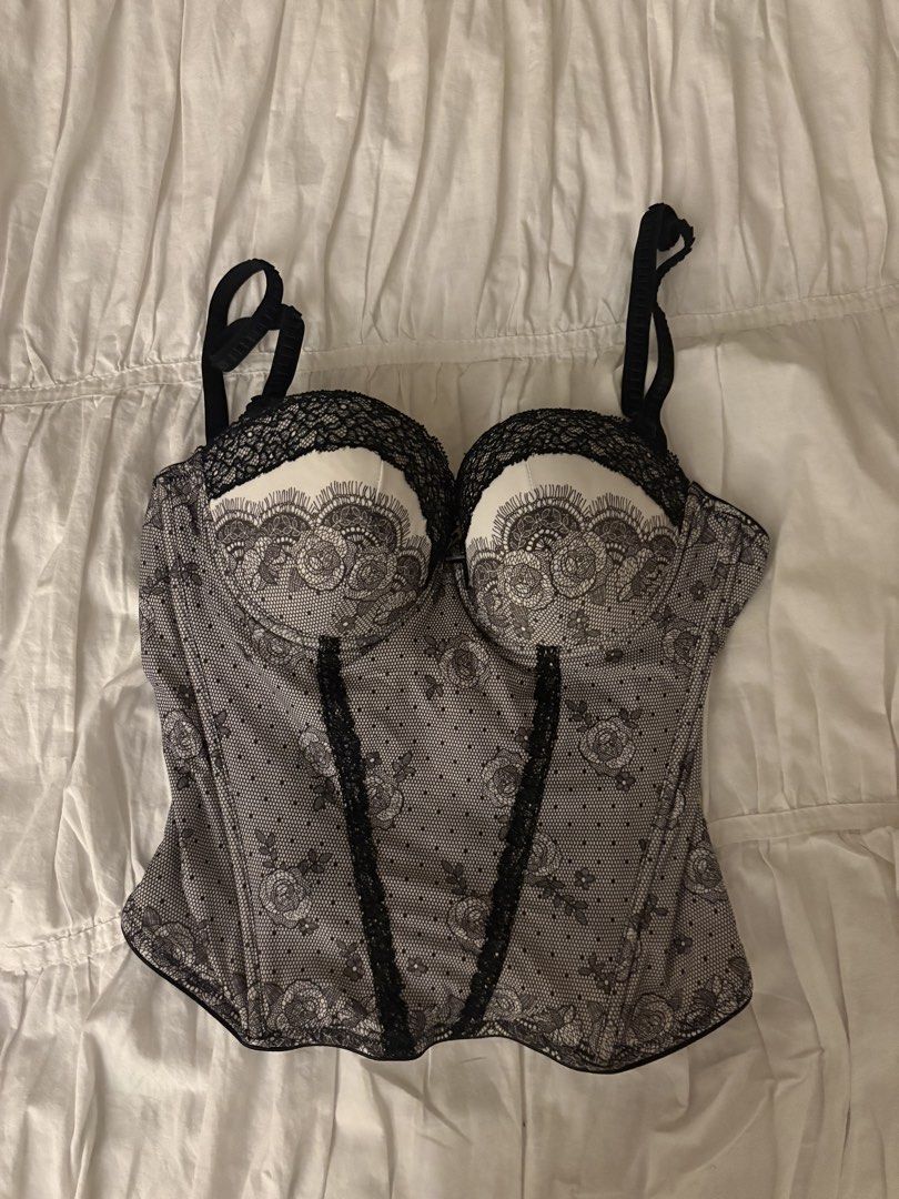 Lace Corset with Floral Pattern Vintage (Category: Others Tops) located in Makati City. Submitted by audrey.hepburn (Listing ID 1436533432, Image 3). Description: - Black lace corset - Floral pattern - Adjustable straps - Lace and white fabric cup details - Designed for a flattering silhouette.
