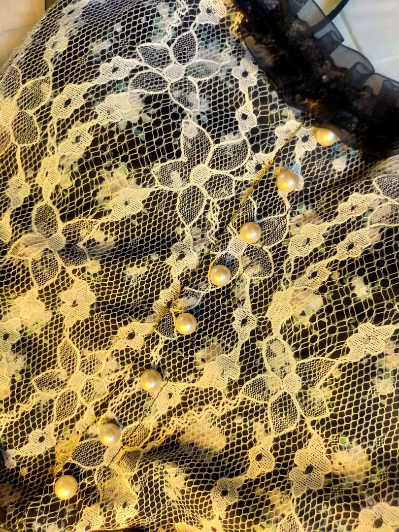 Lace Top with Pearl Details (Category: Sleeveless) located in Cavite. Submitted by berriechlo (Listing ID 1436479902, Image 2). Description: - Delicate floral lace top - Black trim and thin straps - Adorned with pearl details - White lace over black base - Fitted silhouette.