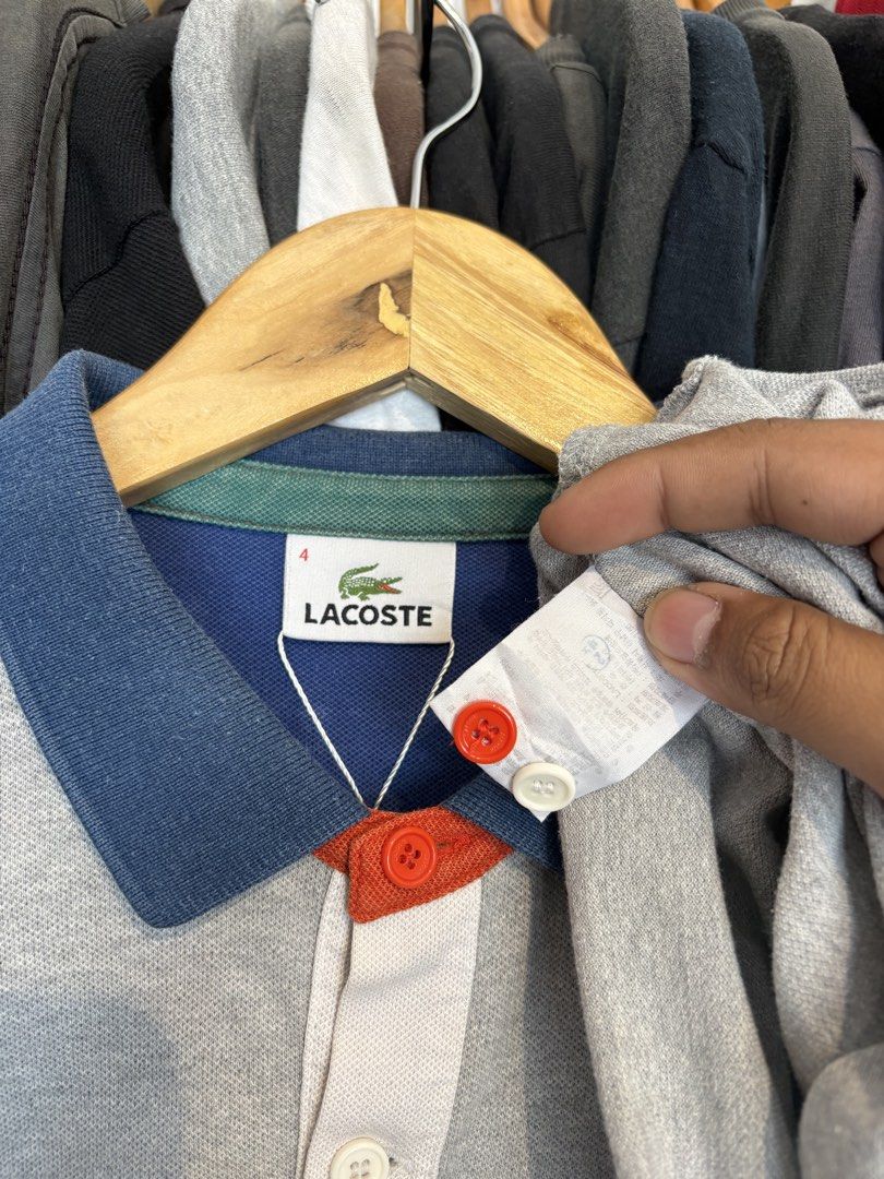 Lacoste w/ pocket polo-short multi color (Category: Tshirts & Polo Shirts ) located in General Santos City (Dadiangas). Submitted by scrtshp (Listing ID 1436503810, Image 3). Description: 19.5x27-28 (Long back) size 4 on tag (Medium frame) Very minimal collar line fade.