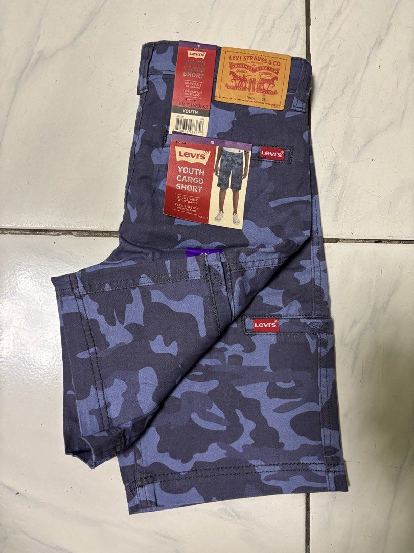 Levi's Youth Cargo Shorts (Category: Shorts) located in Bayombong. Submitted by calthrift.us (Listing ID 1436570486, Image 2). Description: - Levi's Youth Cargo Shorts - Size 10 - Blue camouflage pattern - Adjustable waistband - Flex stretch material - Cargo pockets - Levi's logo - New with tags 700 each .