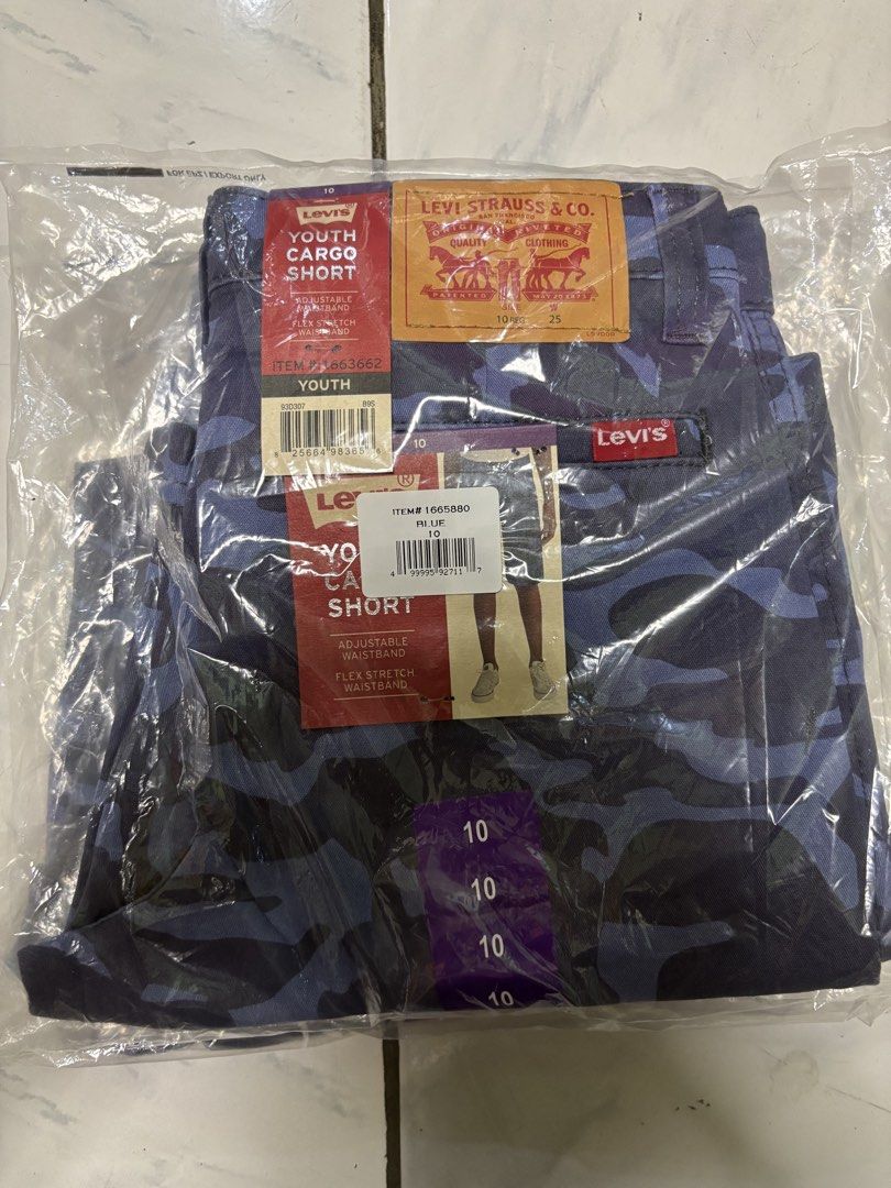 Levi's Youth Cargo Shorts (Category: Shorts) located in Bayombong. Submitted by calthrift.us (Listing ID 1436570486, Image 3). Description: - Levi's Youth Cargo Shorts - Size 10 - Blue camouflage pattern - Adjustable waistband - Flex stretch material - Cargo pockets - Levi's logo - New with tags 700 each .