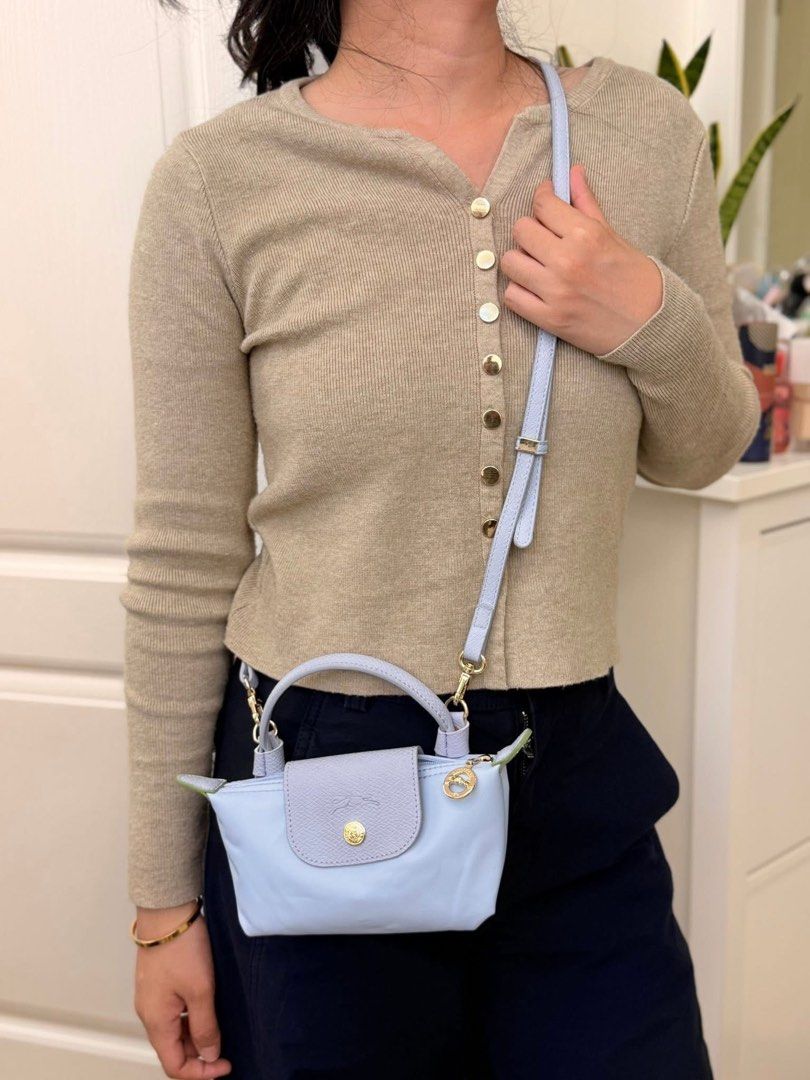 Longchamp Le Pliage Mini (Category: Luxury Bags & Wallets) located in Jaen. Submitted by hallofluxee (Listing ID 1436601056, Image 2). Description: Authentic Longchamp Le Pliage Cuir crossbody bag in light blue. Features a flap closure with gold-tone hardware. Perfect for everyday use..