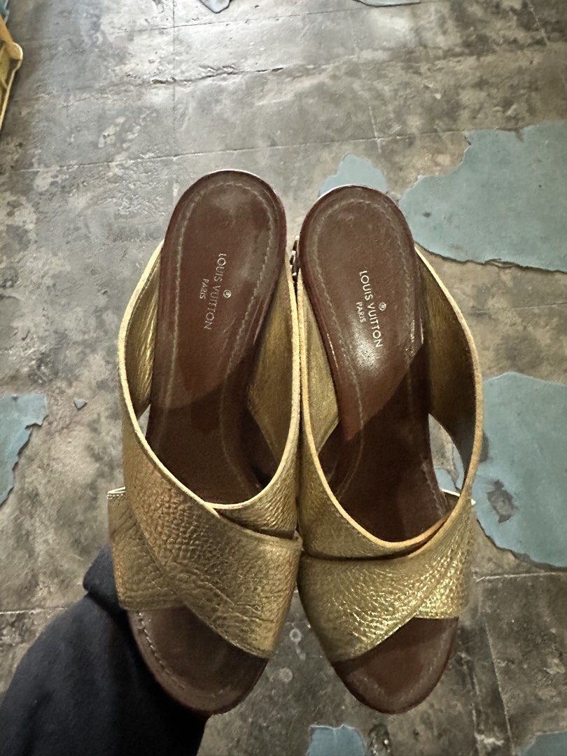 Louis Vuitton Gold Studded Heels (Category: Sneakers & Footwear) located in Caloocan City. Submitted by reywearfinds (Listing ID 1436560900, Image 1). Description: - Louis Vuitton heels in gold - Criss-cross strap design - Studded block heel - Slip-on style - Branded Louis Vuitton insole - Brown leather insole - Gold exterior.