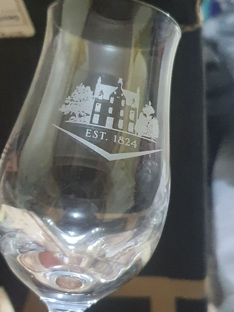 Macallan "Nosing" Tasting Tulip Glass (Category: Beverages) located in Quezon City. Submitted by cuiquesuum (Listing ID 1436645297, Image 2). Description: - Baguio City loc/ for shipping only - Set of 2 Macallan glasses, Stölzle marking - Etched with logo and "EST. 1824" - Clear glass, chipping at the base - Used condition - Ideal for whisky "nosing" - Excellent addition to your home bar.