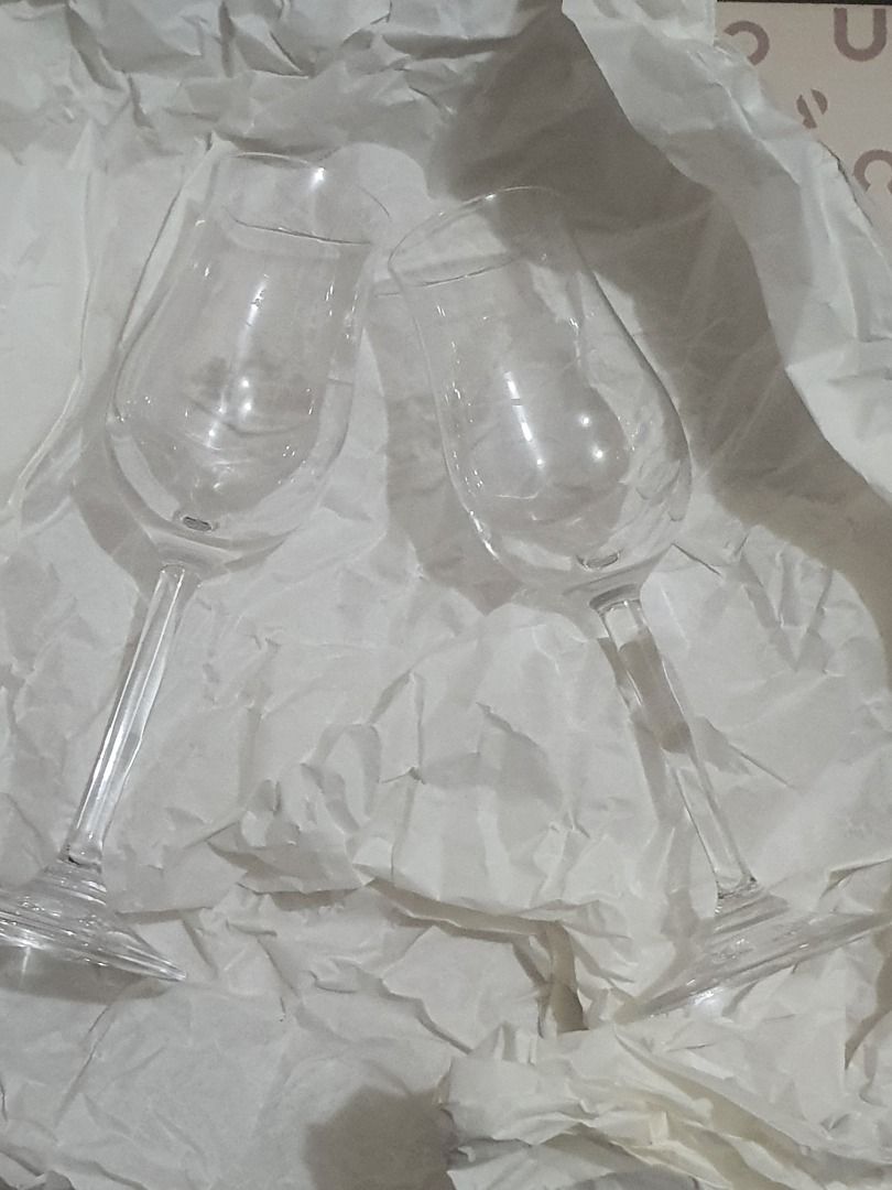 Macallan "Nosing" Tasting Tulip Glass (Category: Beverages) located in Quezon City. Submitted by cuiquesuum (Listing ID 1436645297, Image 1). Description: - Baguio City loc/ for shipping only - Set of 2 Macallan glasses, Stölzle marking - Etched with logo and "EST. 1824" - Clear glass, chipping at the base - Used condition - Ideal for whisky "nosing" - Excellent addition to your home bar.