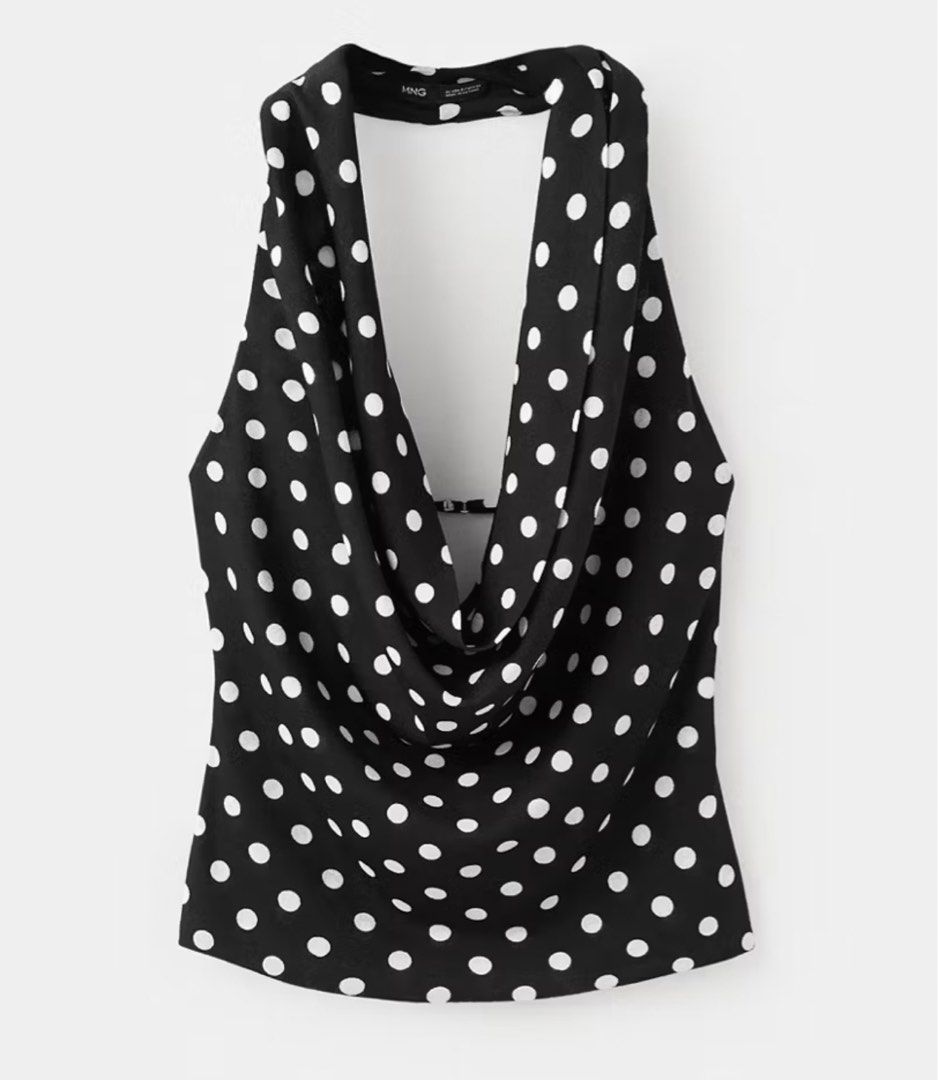 Mango Draped Halter Top (Category: Sleeveless) located in Davao. Submitted by audstuff (Listing ID 1436494111, Image 1). Description: - Black halter top with white polka dots - Features a stylish cowl neckline - Open back design - Made from lightweight, flowing fabric - Perfect for a night out or special occasion - Bought in Mango - Still avail in stores for ₱1695 - Used once only no flaws.