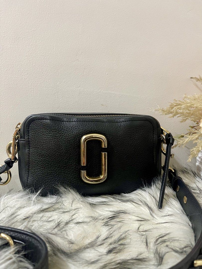 Marc Jacobs Black Leather Camera Sling Bag (Category: Luxury Bags & Wallets) located in Teresa. Submitted by savvyonbranded (Listing ID 1436519000, Image 1). Description: Dimensions : 5.5 x 9 x 4 inches .