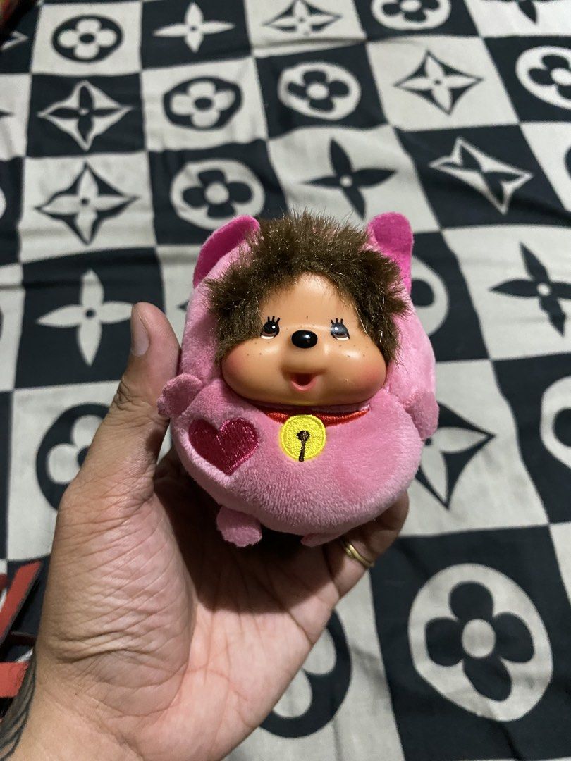 McDonald's 2016 Monchhichi Plush Toy (Category: Plushies & Soft Toys) located in Marikina City. Submitted by rainstuff77 (Listing ID 1436543730, Image 1). Description: - McDonald's Monchhichi plush toy - Released in 2016 as a promotional item - Features a pink body with a heart design - Includes a bell collar - Adorable brown hair and face - Comes with the original McDonald's tag - Perfect for plush toy collectors!.
