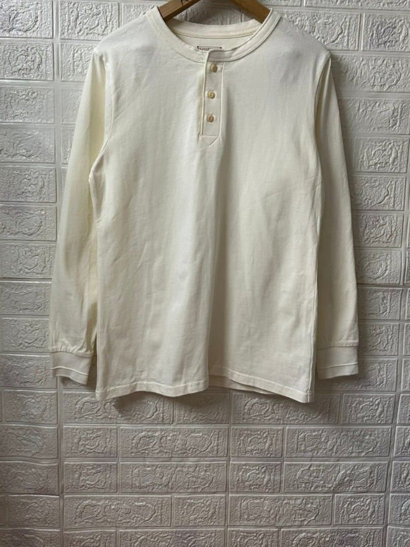 Men's Henley Long Sleeve Shirt (Category: Tshirts & Polo Shirts ) located in General Santos City (Dadiangas). Submitted by markinho_ideas (Listing ID 1436504707, Image 2). Description: - Cream-colored long sleeve Henley shirt - Features a three-button placket - Ribbed cuffs - Crew neck - Relaxed fit - Made of soft, comfortable material - Perfect for casual wear.